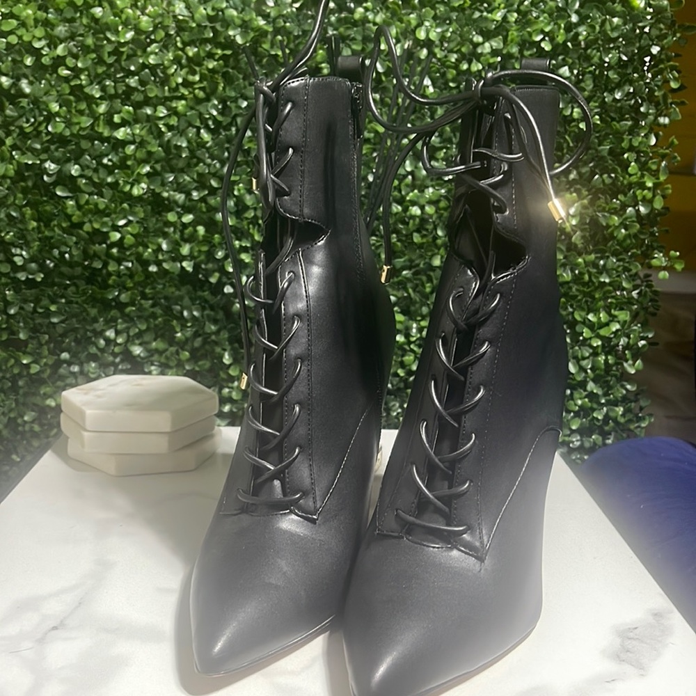 Black ALDO point toe tie up boots